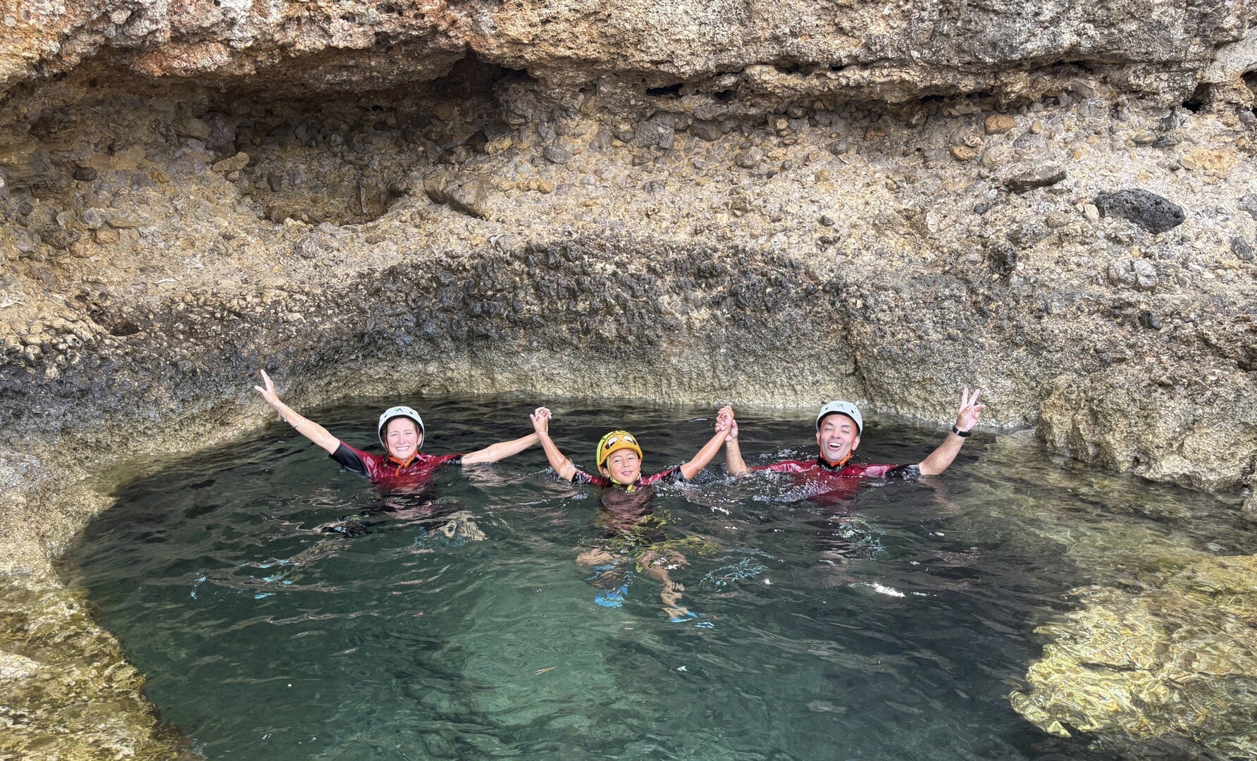 Exploring a sea cave while coasteering in Alcudia