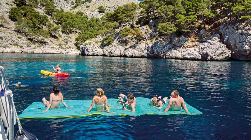 floating mat on the catamaran tour