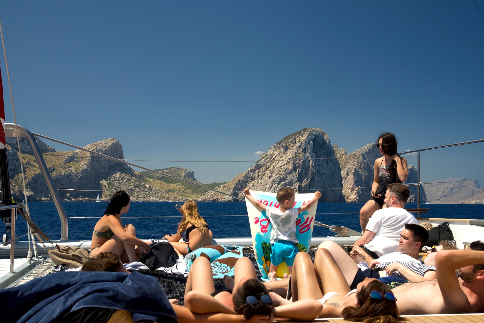 people enjoying the sunset catamaran in alcudia